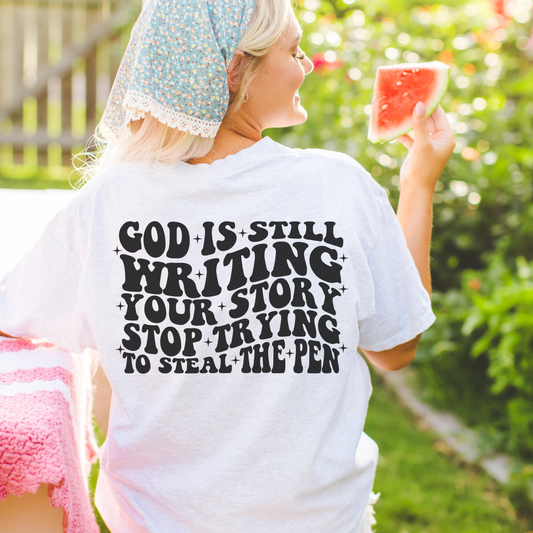 God is still writing your story tee